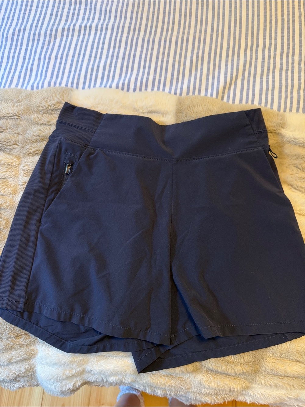 Athleta Brooklyn Navy Blue Athletic Shorts with Hidden Zip Pocket